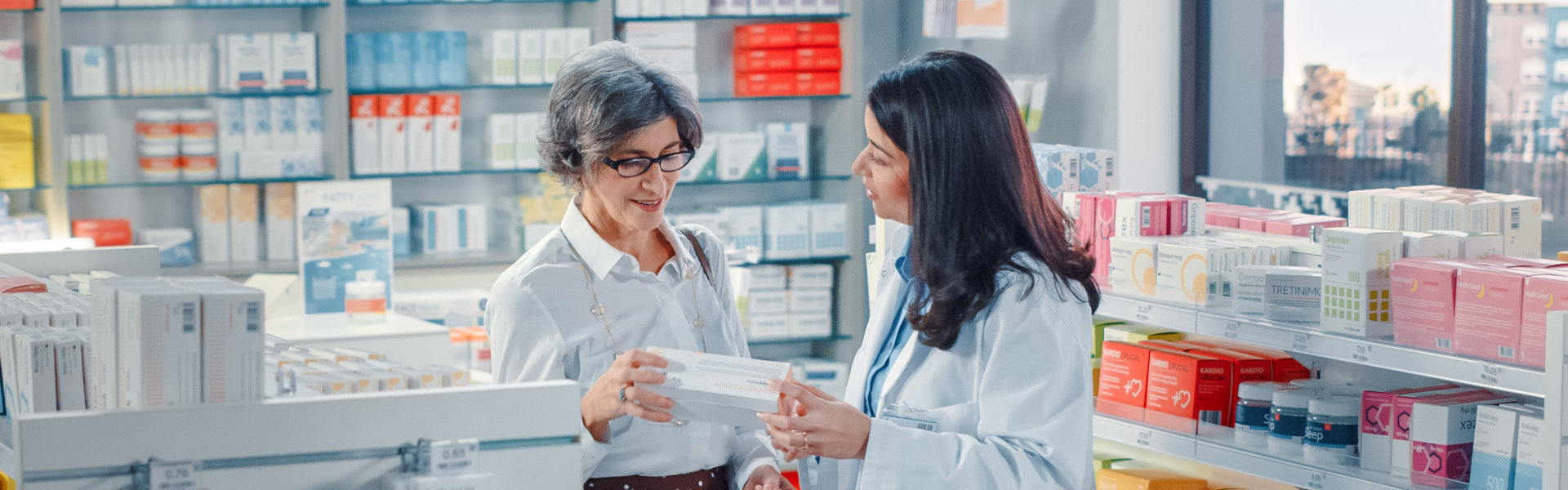 senior woman talking to a pharmacist