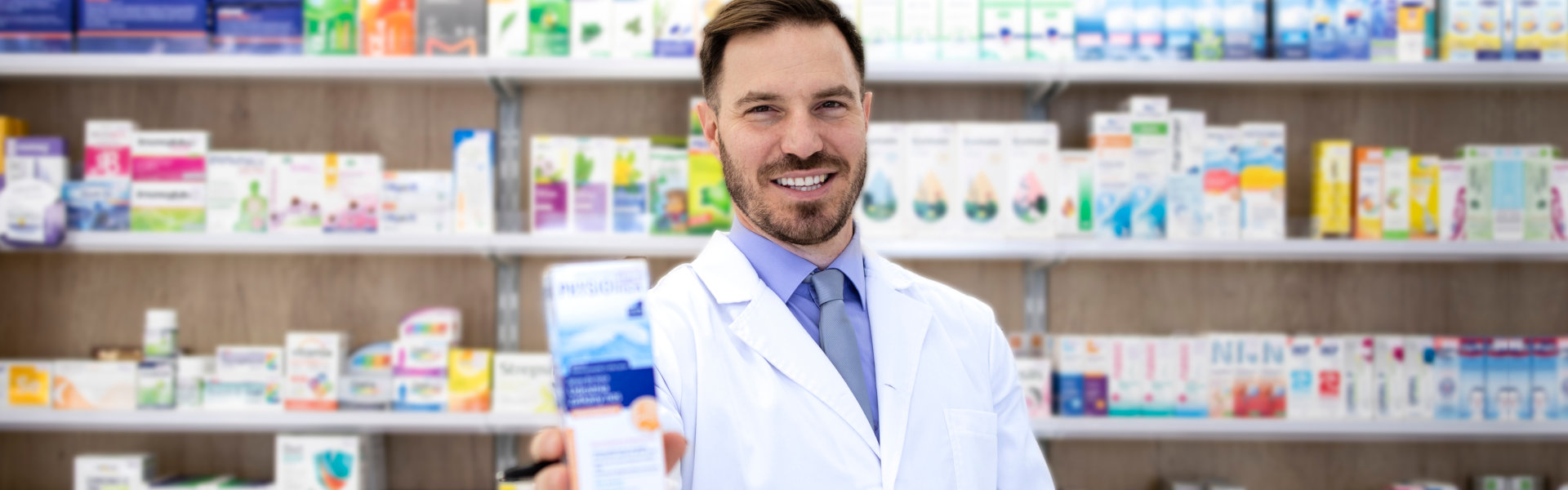 male pharmacist smiling