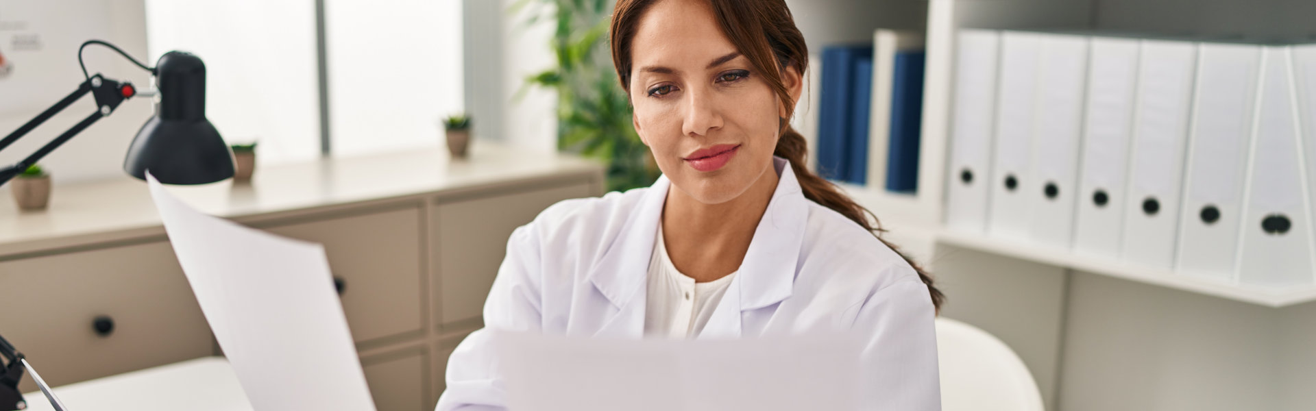 woman in the office looking at documents