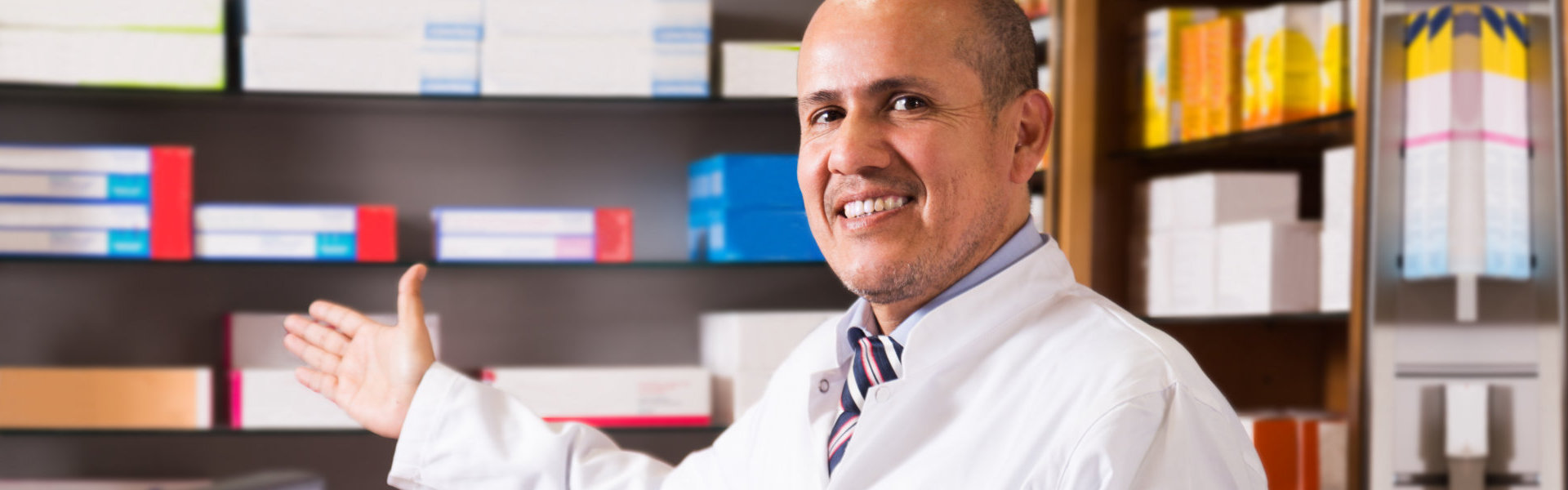 pharmacist showcasing his medicines